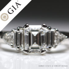 GIA certified emerald cut three stone diamond ring